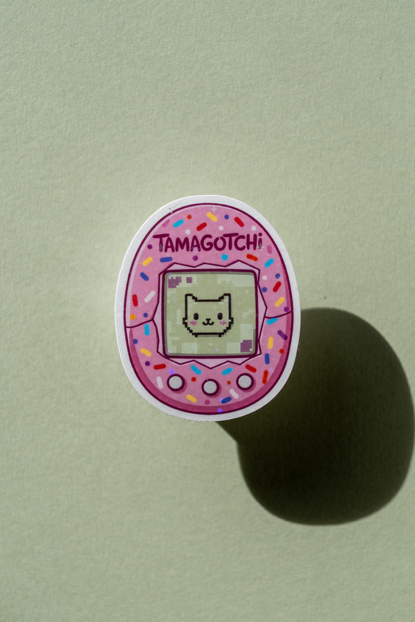 pink tamagotchi sticker - the post club ✰ by klari edition "y2k time capsule"